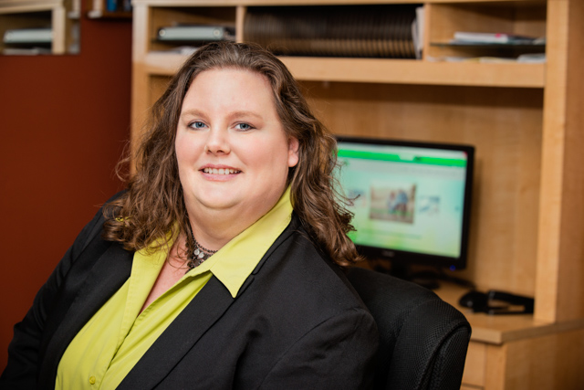 Kim Erick at her desk